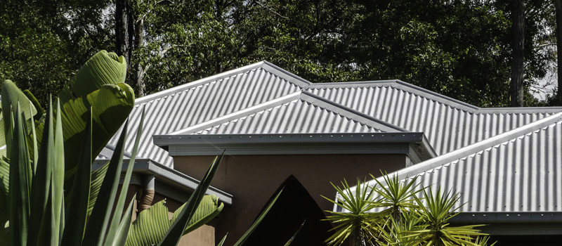 Completed residential metal roof and gutters